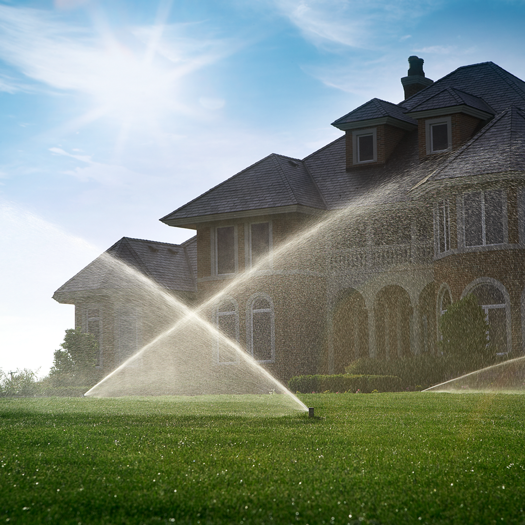 Hunter PGP Ultra adjustable rotor sprinkler arc adjustment feature highlight in use on large lawn
